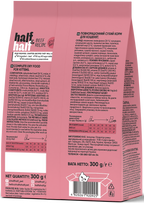 A pink and white bag of Half&Half Complete Dry Kitten Food, featuring a beef recipe. The back of the package displays nutritional information, ingredients, and feeding recommendations, along with contact details and a cute kitten graphic.